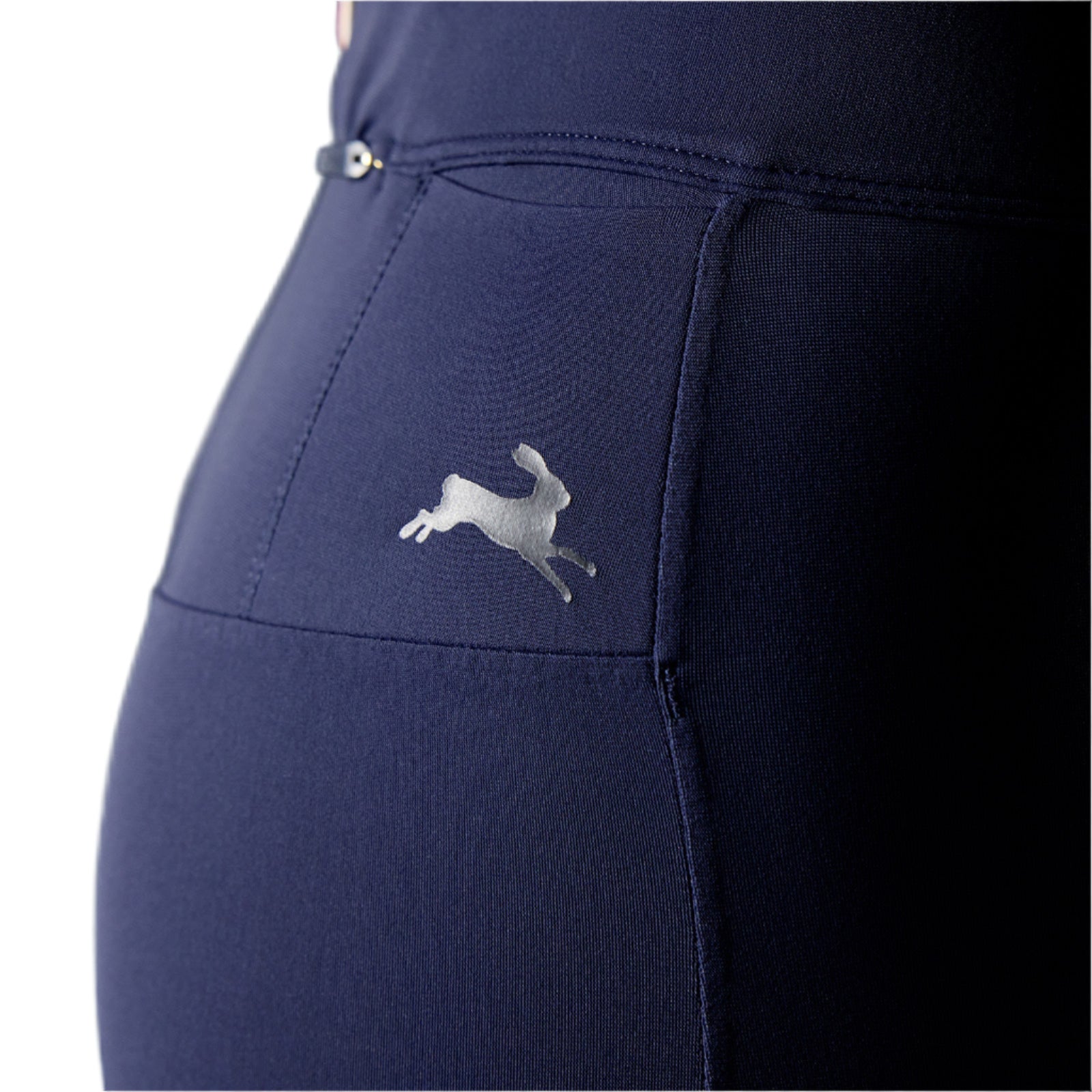 Navy blue pants with a logo on the pocket against a black background