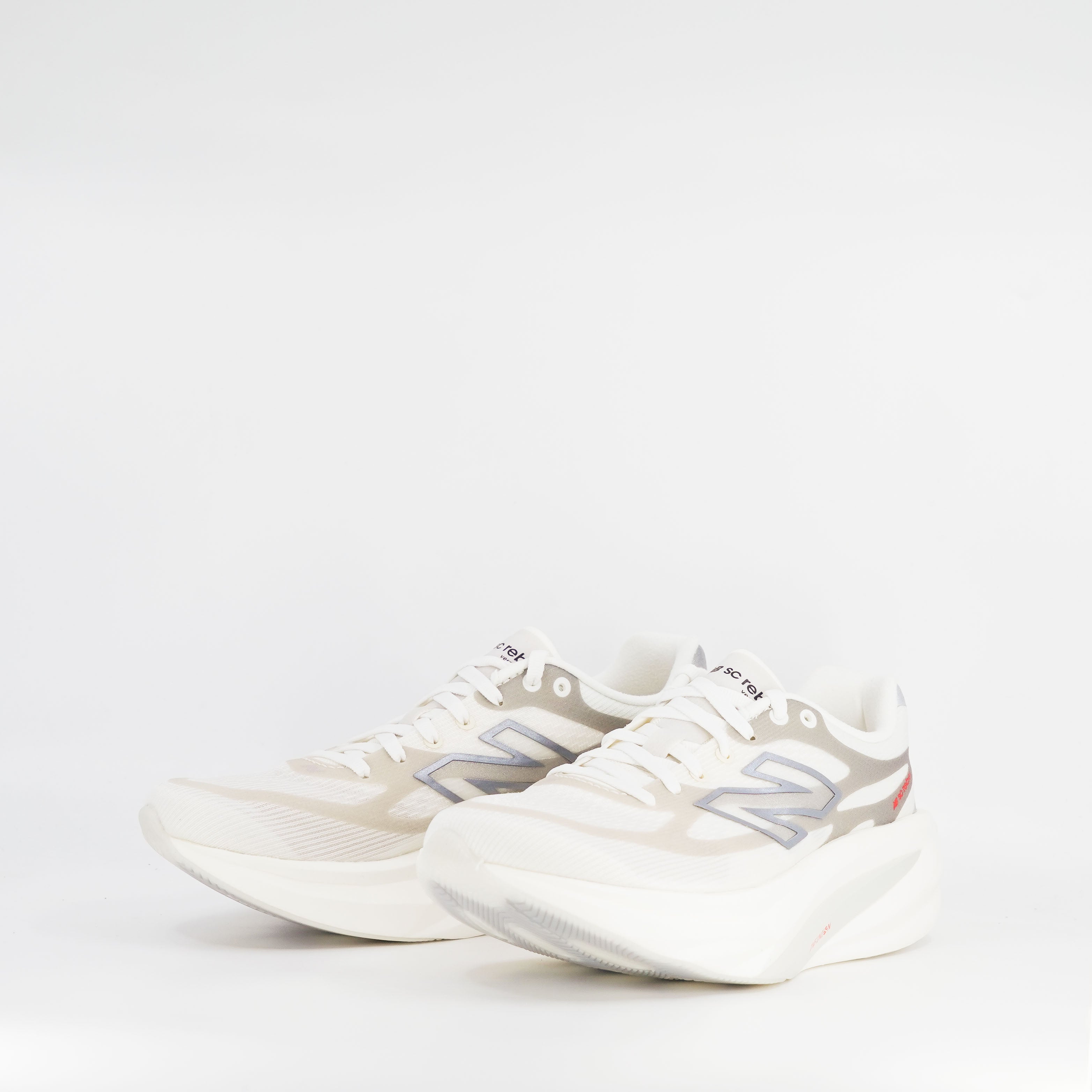 New Balance SuperComp Rebel (B Standard) Womens Sea Salt/Neo Flame - Frontrunner Colombo